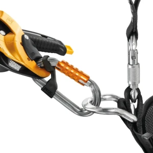 Close-up view of the Petzl M34A AMD Screw-Lock Carabiner, showcasing its silver asymmetrical D-shape and smooth screw-lock mechanism—perfect for arborist rigging and climbing applications. For trusted climbing gear, contact Endor’s Arborist & Rope Supply at (234) 410-3240. Shop safe. Climb smart.